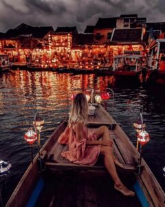 sampan ride along the river during Hoi An Lantern Festival is so peaceful 